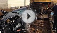 Accident involving 1 car and 2 trains sends woman to